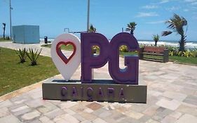 Pé na areia praia caiçara
